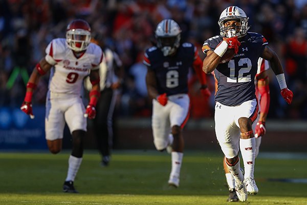 Auburn wide receiver Eli Stove (12) breaks away for a touchdown against Arkansas during the first half of an NCAA college football game, Saturday, Oct. 22, 2016, in Auburn, Ala. (AP Photo/Butch Dill)

