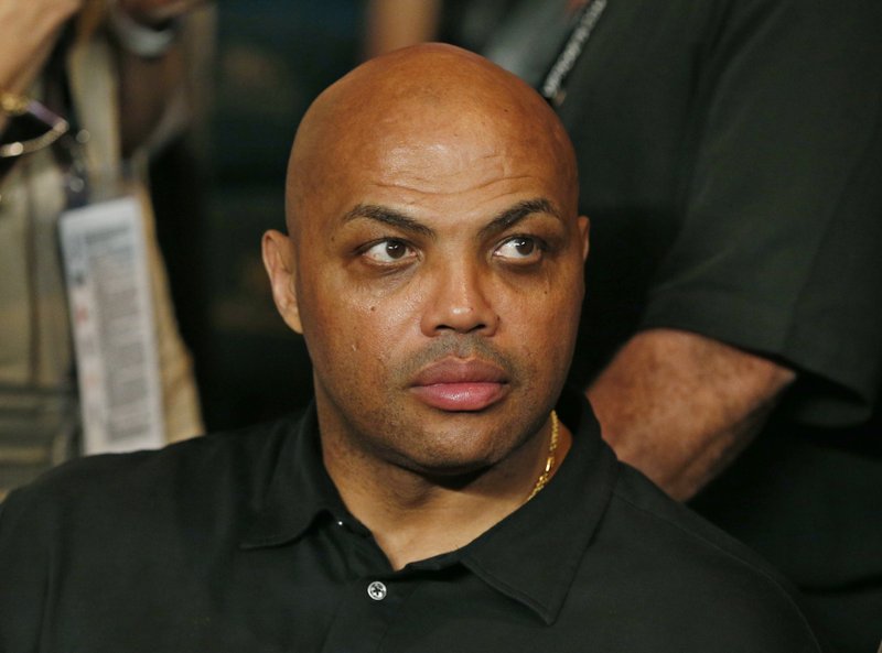 In this May 2, 2015, file photo, Charles Barkley joins the crowd before the start of the world welterweight championship bout between Floyd Mayweather Jr., and Manny Pacquiao in Las Vegas.  