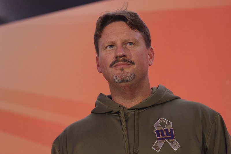 New York Giants head coach Ben McAdoo stands on stage during an NFL Fan Rally at the NFL House in Victoria House, in London, Saturday Oct. 22, 2016. The Los Angeles Rams are due to play the New York Giants at Twickenham stadium in London on Sunday in a regular season NFL game. 