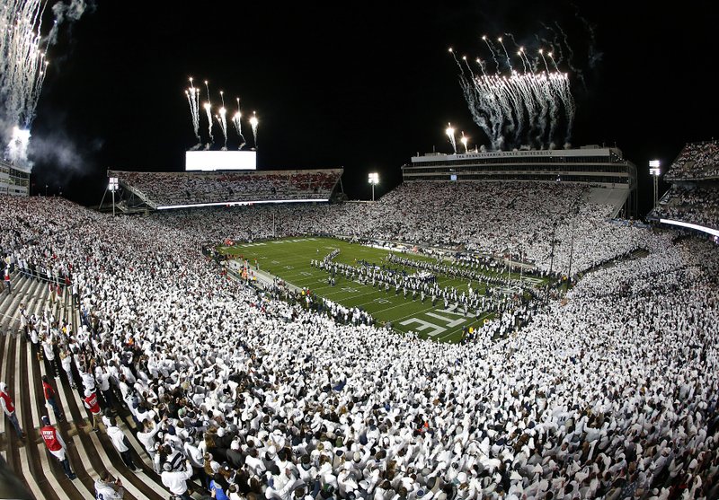 The band plays on the field before an NCAA college football game between Ohio State and Penn State in State College, Pa., Saturday, Oct. 22, 2016. 