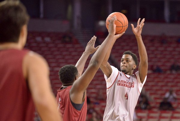 Daryl Macon of the White team shoots on Sunday Oct. 23, 2016 during the Red-White game at Bud Walton Arena in Fayetteiville.