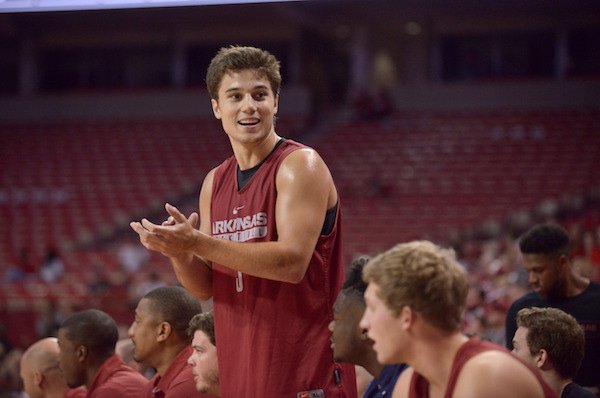 Dusty Hannahs of red reacts from the bench on Sunday Oct. 23, 2016 during the Red-White game at Bud Walton Arena in Fayetteiville.