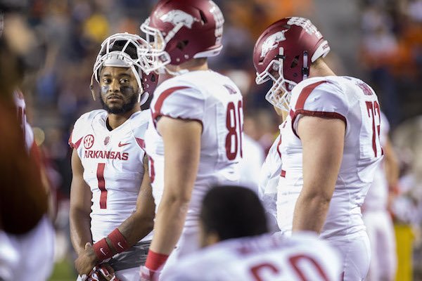 Arkansas Razorbacks wide receiver Jared Cornelius (1) (left) stands on the sideline with teammates on Saturday, Oct. 22, 2016, during the fourth quarter against Auburn at Jordan-Hare Stadium in Auburn, Ala.