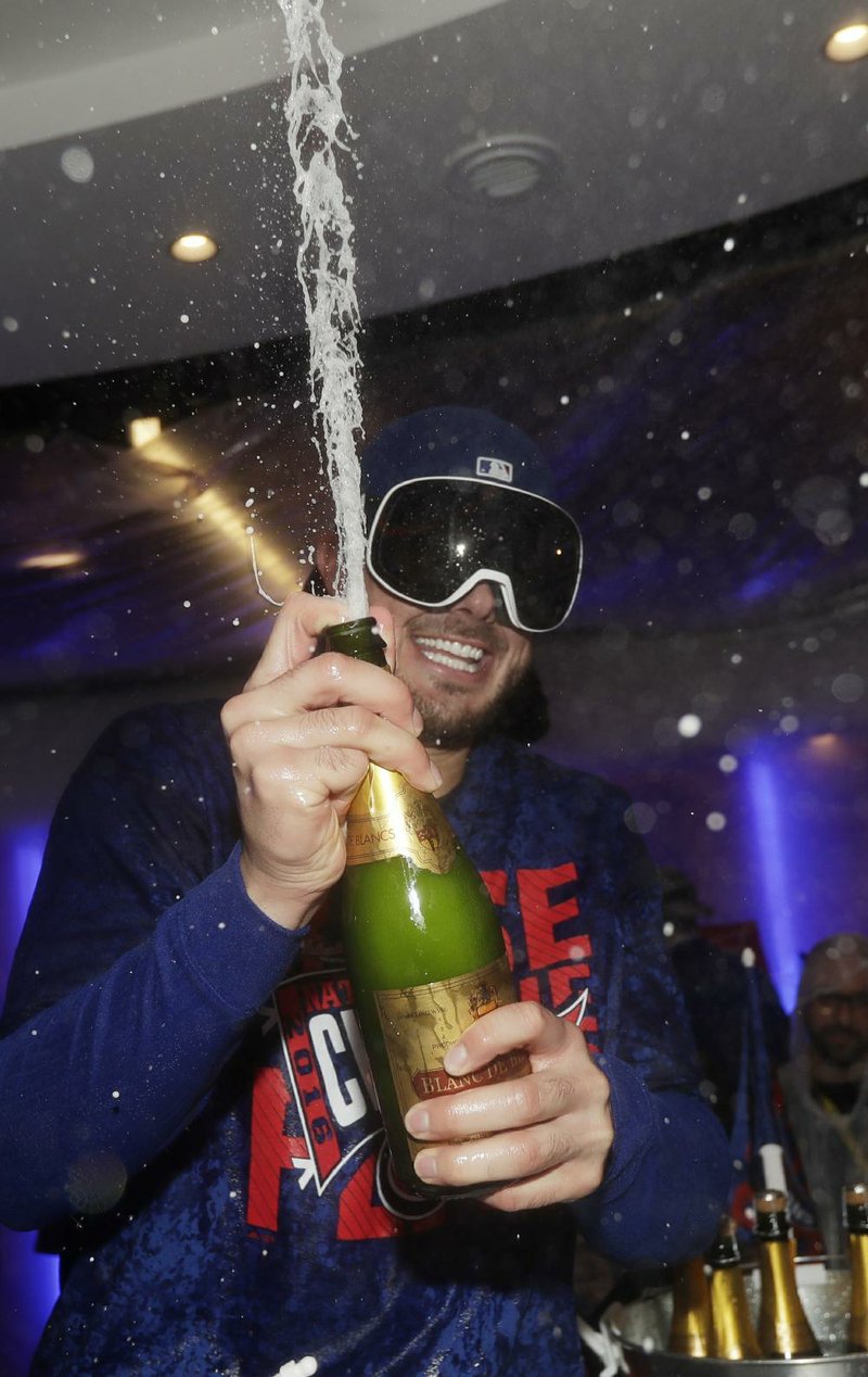 Chicago Cubs third baseman Kris Bryant celebrates after the Cubs defeated the Los Angeles Dodgers on Saturday night to advance to the World Series for the first time since 1945.