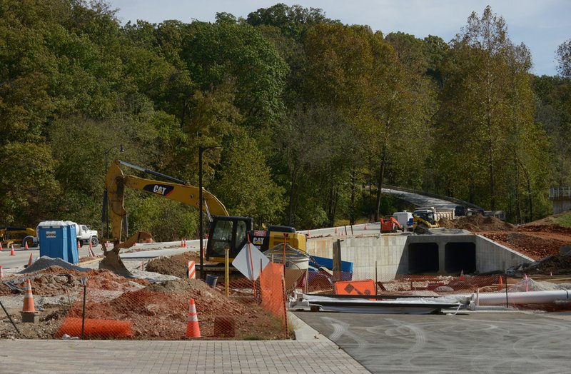 A view of construction on East Walnut Street on Sunday at Lake Atalanta Park in Rogers. The park, which has been closed for more than a year for construction and renovation, is set to reopen with a celebration on Saturday.