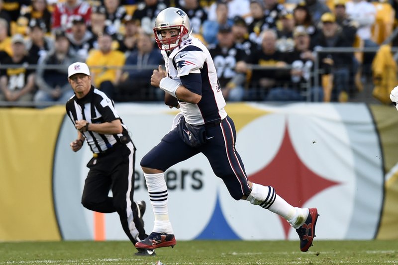 New England Patriots quarterback Tom Brady (12) scrambles during the first half of an NFL football game against the Pittsburgh Steelers in Pittsburgh, Sunday, Oct. 23, 2016. 