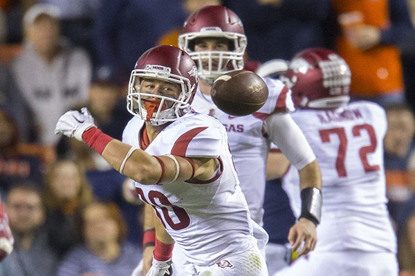 Arkansas receiver Drew Morgan watches a ball go past him during a game against Auburn on Saturday, Oct. 22, 2016, in Auburn, Ala. 