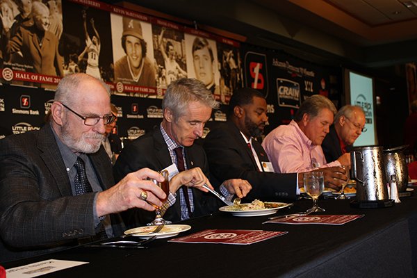 Southwest Conference Hall of Fame inductees Cliff Powell, Frank O'Mara, Lee Mayberry, Kevin McReynolds and Ed Page of Waco, Texas, board president of the Texas Hall of Fame, at an induction ceremony for Arkansan athletes into the Texas-based Southwest Conference Hall of Fame, Oct. 24, 2016, at Embassy Suites in Little Rock.