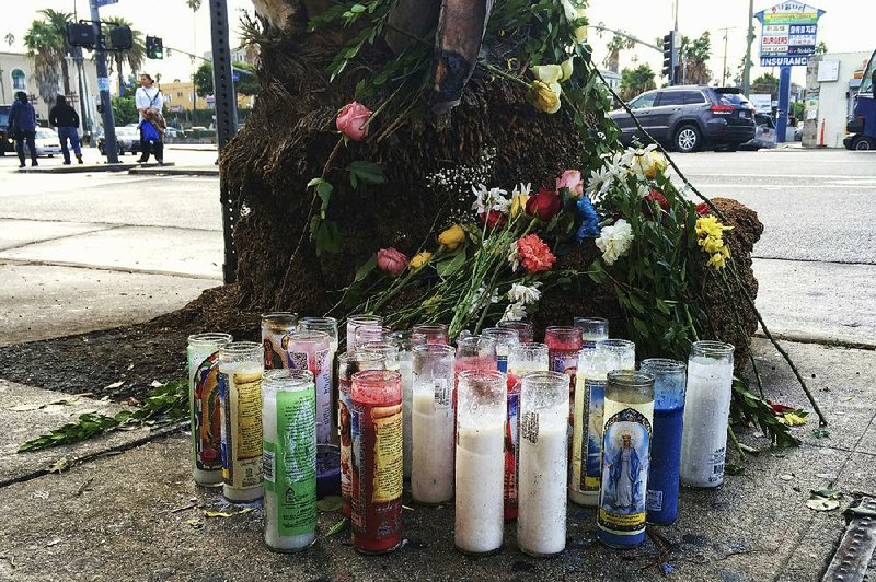A makeshift memorial for the victims of a tour bus crash is shown Monday in Los Angeles.