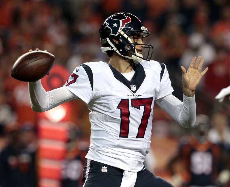 Houston Texans quarterback Brock Osweiler (17) throws against the Denver Broncos during the first half of an NFL football game, Monday, Oct. 24, 2016, in Denver. 