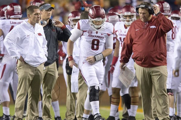 Equipped with a knee brace, Arkansas quarterback Austin Allen (8) prepares to re-enter the game during the third quarter on Saturday, Oct. 22, 2016, against Auburn at Jordan-Hare Stadium in Auburn, Ala.
