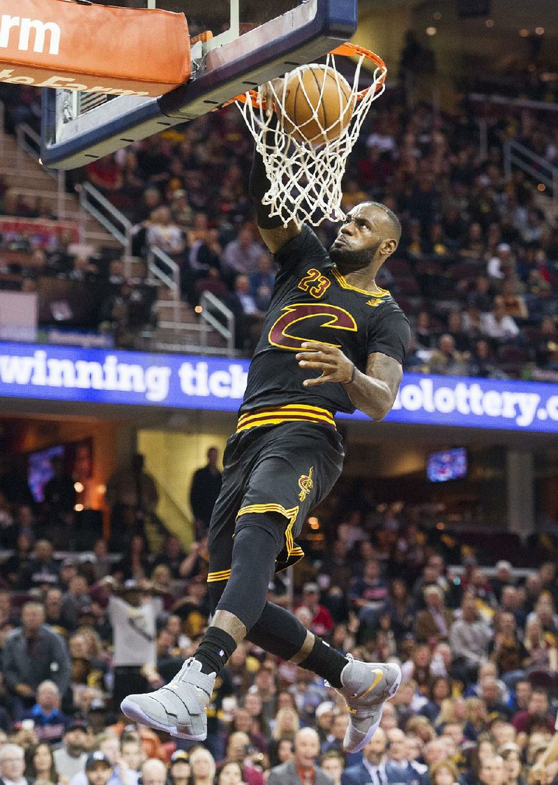 Cleveland forward LeBron James finished with 19 points, 14 assists and 11 rebounds for the Cavaliers in their season-opening 117-88 victory over New York on Tuesday.