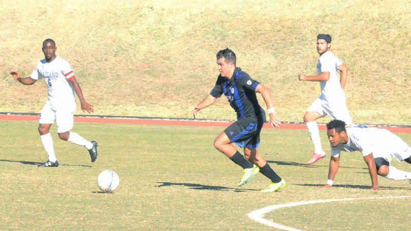 Photo courtesy of JBU Sports Information John Brown University junior midfielder Collin Smith runs to the ball on Saturday against Wayland Baptist.