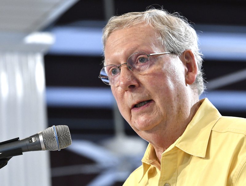 In this Aug. 6, 2016, file photo, Majority Leader Mitch McConnell of Kentucky, addresses the crowd gathered at the Fancy Farm Picnic in Fancy Farm Ky. 