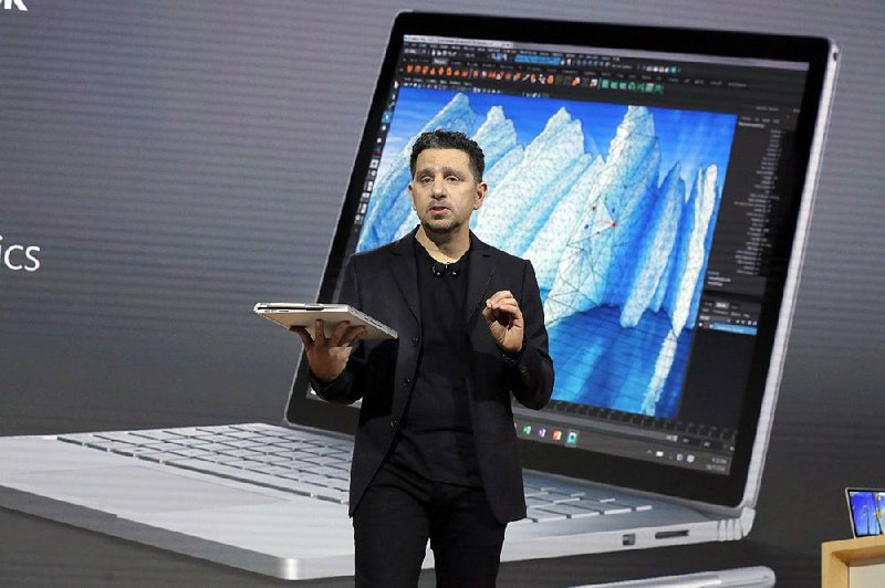 Panos Panay, with Surface Computing at Microsoft Corp., introduces the new Surface Book laptop Wednesday in New York. 