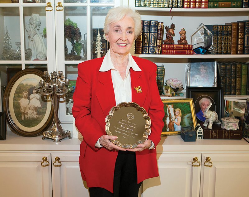 Joan Zumwalt of Jacksonville holds her award for being inducted into the Arkansas State Independent
Living Council’s Circle of Service. She received the honor Oct. 18 in Little Rock. Zumwalt started Pathfinder Inc., a Jacksonville-based company that provides skills training and sheltered living for people with disabilities.