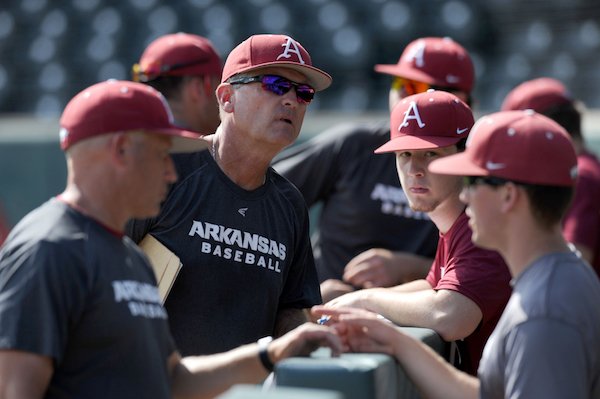 Arkansas coach Dave Van Horn speaks to his players Friday, Sept. 9, 2016, during practice at Baum Stadium in Fayetteville.