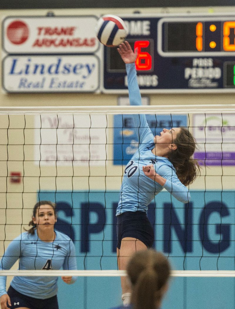 Springdale Har-Ber’s Lauren Thompson (20) of spikes the ball during Thursday’s match against Conway in the Class 7A State Tournament at Wildcat Arena in Springdale. The Lady Wildcats won in 3-2 and advanced to the 7A state championship game Saturday against Fatetteville.