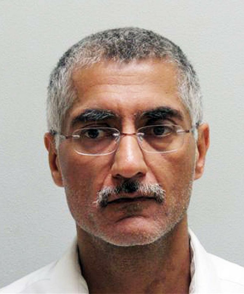  This file photo released Aug. 18, 2009, by the Pulaski County Sheriff's Office shows  Dr. Randeep Mann. 