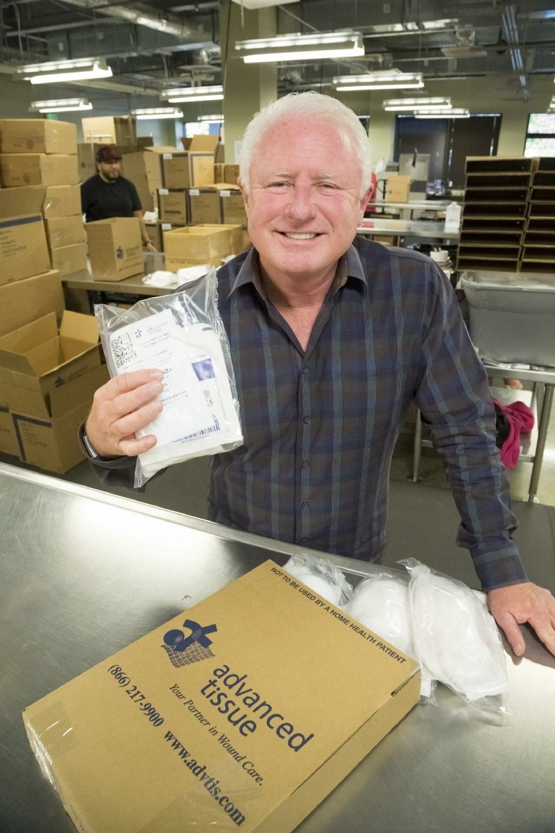 Kevin Lamb, chief executive officer of Little Rock company Advanced Tissue, holds one of the company’s single-packet treatments for wound care. 