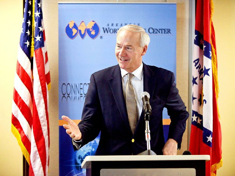 Gov. Asa Hutchinson speaks on Friday Aug. 12, 2016 during a grant award announcemnt ceremony at the World Trade Center Arkansas in Rogers. 