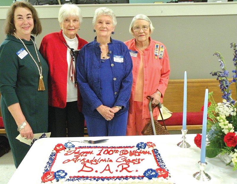 The Arkadelphia Chapter of the National Society Daughters of the American Revolution celebrated its 100th anniversary Tuesday at First United Methodist Church in Arkadelphia. Charlotte Jeffers, from left, chapter regent, congratulates three longtime members — Margaret “Peg” Officer Duncan, second from left, Barbara Mayo Rhodes and Cynthia Still Keyton.