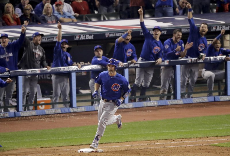 Chicago Cubs' David Ross rounds the bases after a home run against the Cleveland Indians during the sixth inning of Game 7 of the Major League Baseball World Series Wednesday, Nov. 2, 2016, in Cleveland. (AP Photo/Charlie Riedel)
