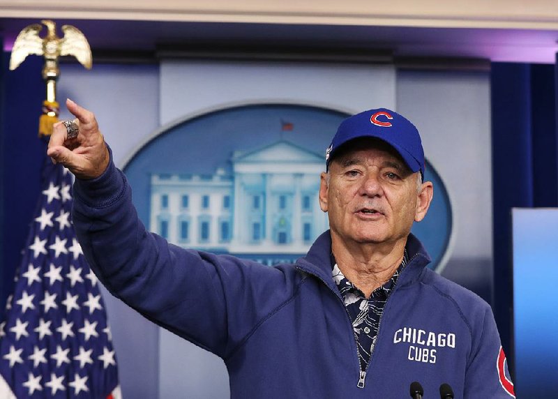 Comedian/actor and Chicago Cubs superfan Bill Murray became the savior to a fellow fan at Cleveland’s Progressive Field on Tuesday when he gave a ticket to Karen Michel, who drove from Evanston, Ill., to Cleveland without a ticket. 