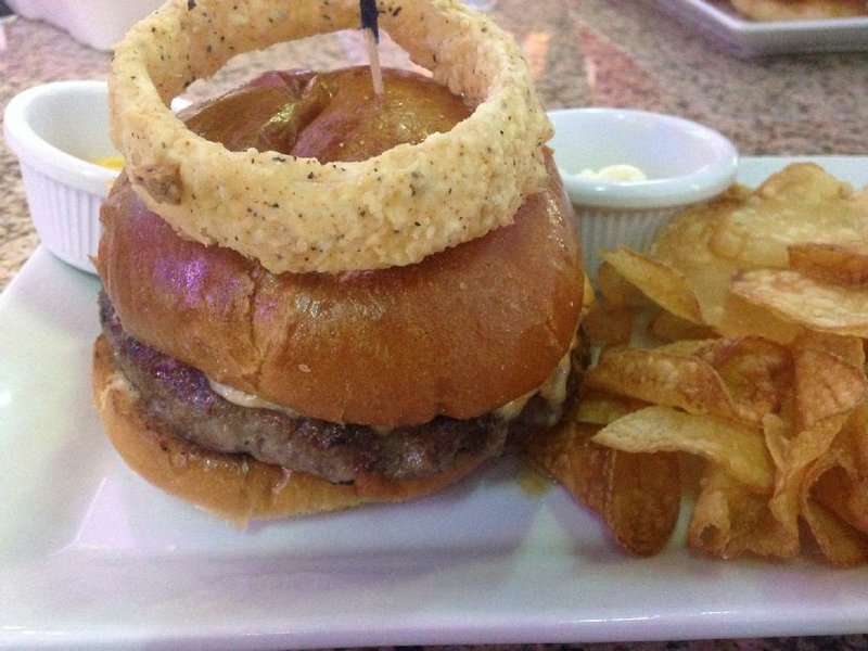 The pimento cheese topping the Bang Pow Burger at Prospect Sports Bar & Grill sends the basic burger into new territory. 