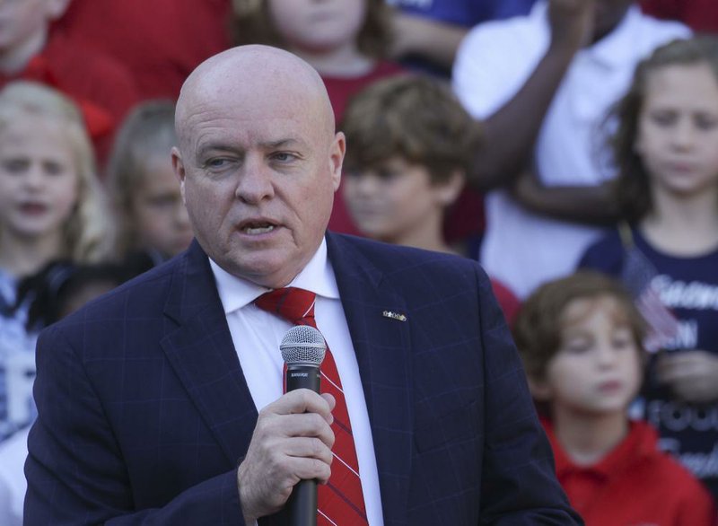 Little Rock School District Superintendent Michael Poore speaks to students at Forest Park Elementary School during the school's annual Patriotic Assembly.