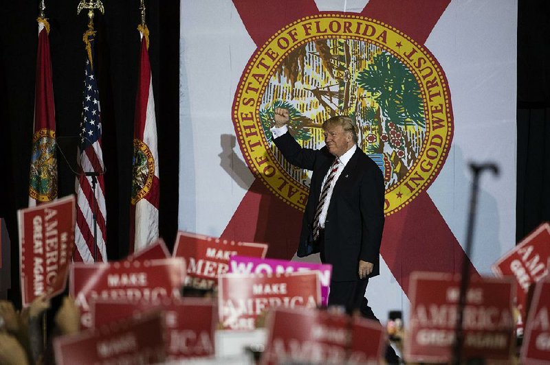 Donald Trump arrives for a campaign stop Thursday in Jacksonville, Fla.