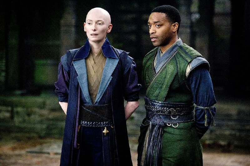 The Ancient One (Tilda Swinton) dispenses wisdom to the warrior Mordo (Chiwetel Ejiofor) in Doctor Strange, the Scott Derrickson-directed superhero film that’s the latest installment of the Marvel universe’s ongoing cinematic saga.