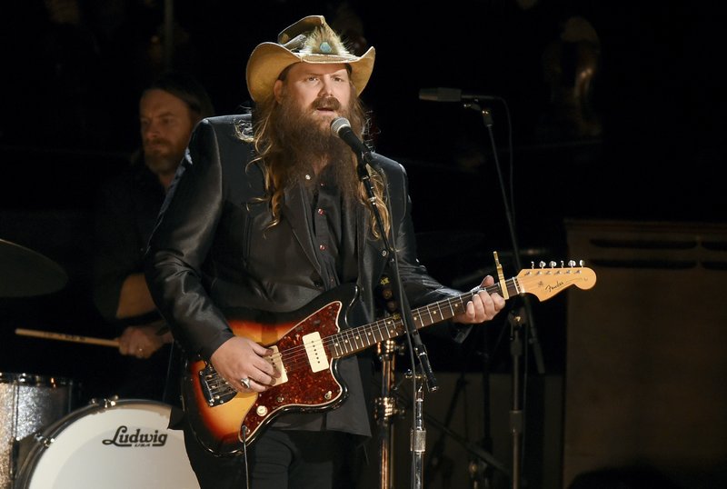 Chris Stapleton performs &quot;Seven Spanish Angels&quot; at the 50th annual CMA Awards at the Bridgestone Arena on Wednesday, Nov. 2, 2016, in Nashville, Tenn. (Photo by Charles Sykes/Invision/AP)
