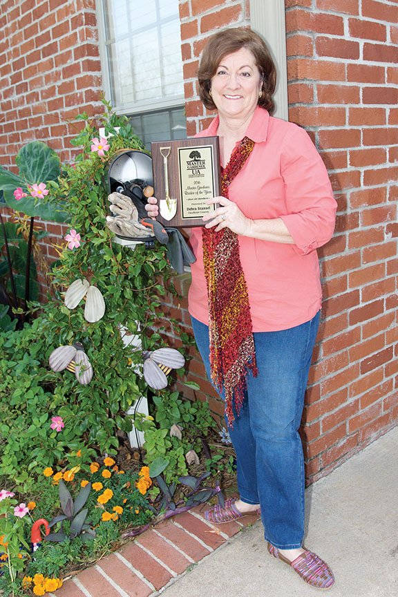 Debra Stansel of Conway is the 2016 Master Gardener Rookie of the Year for programs with 51 or more members. She was first named Faulkner County Master Gardener Rookie of the Year, then was recognized as the state winner in June.