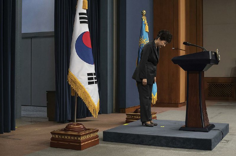 South Korean President Park Geun-hye gets ready to address the nation Friday in Seoul. “I feel a huge responsibility deep in my heart,” she said about the scandal rocking her administration.