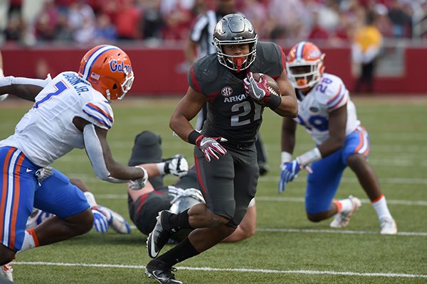 Arkansas running back Devwah Whaley carries the ball during a game against Florida on Saturday, Nov. 5, 2016, in Fayetteville. 