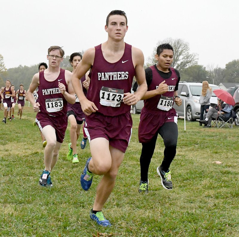Bud Sullins/Special to Siloam Sunday Siloam Springs boys cross country runners, from left, Parker Wallis, Charlie Jones and Carlos Reyes run the first lap of the 6A-West Conference boys meet on Thursday at the Simmons Course. Lake Hamilton won the meet with Siloam Springs placing third.