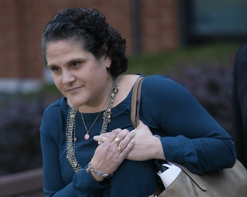 In this Tuesday, Nov. 1, 2016, file photo, University of Virginia administrator Nicole Eramo leaves federal court after closing arguments in her defamation lawsuit against Rolling Stone magazine in Charlottesville, Va. 