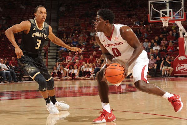 Arkansas' Jaylen Barford (0) drives around Emporia State's Tyler Jordan Friday, Nov. 4, 2016, during the second half of play in Bud Walton Arena in Fayetteville.