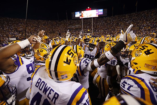 LSU huddles before an NCAA college football game against Alabama in Baton Rouge, La., Saturday, Nov. 5, 2016. (AP Photo/Gerald Herbert)

