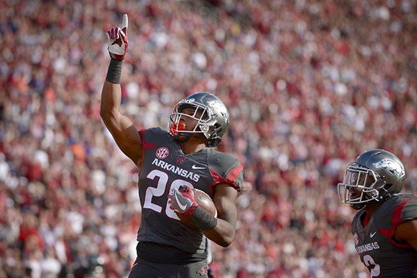 Arkansas safety Josh Liddell celebrates after intercepting a pass during a game against Florida on Saturday, Nov. 5, 2016, in Fayetteville. 