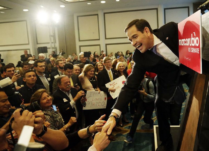 Florida Republican Sen. Marco Rubio greets supporters in Miami, after winning a second term in office on Tuesday. Rubio defeated U.S. Rep. Patrick Murphy, a two-term congressman.