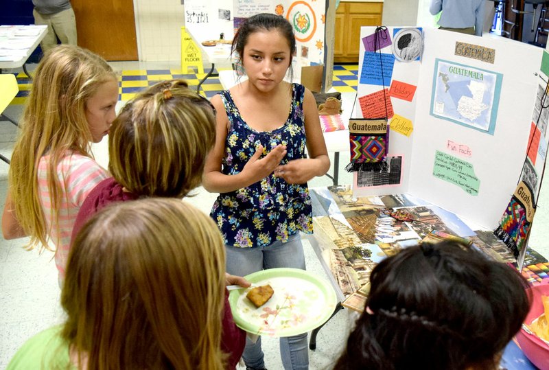 Photo by Mike Eckels This exhibit was one of more than 30 on display during the Decatur Middle School Cultural Night program in the high school cafeteria in Decatur Oct. 27. The fifth- through eighth-grade students were tasked with finding items that best tell the story of their heritage. This particular display shows off the students Mexican heritage.