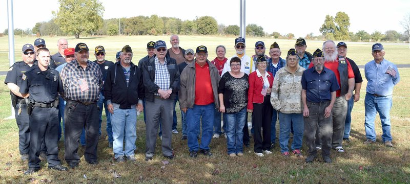 Photo by Mike Eckels This group of veterans were on hand to help celebrate the first annual Veterans Day celebration at Veterans Park in Decatur Nov. 4. The veterans assembled here span five wars, including World War II, Korea, Vietnam, Desert Storm and Iraqi Freedom.