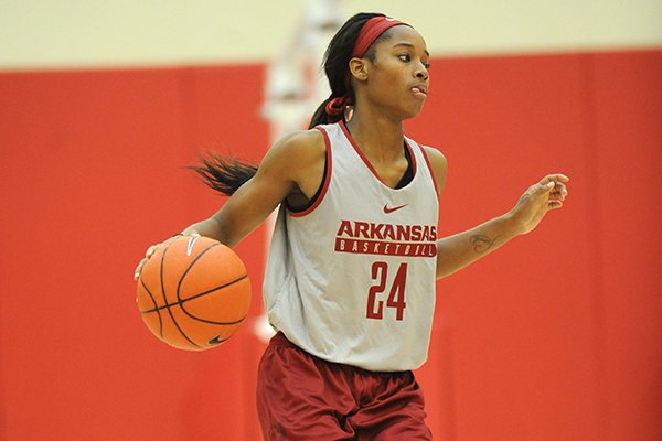 Arkansas guard Jordan Danberry drives with the ball Wednesday, Oct. 12, 2016, in the basketball practice facility on the university campus in Fayetteville.
