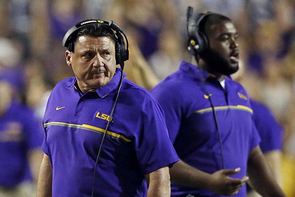 LSU interim head coach Ed Orgeron works the sideline in the second half of an NCAA college football game against Alabama in Baton Rouge, La., Saturday, Nov. 5, 2016. Alabama won 10-0. (AP Photo/Gerald Herbert)