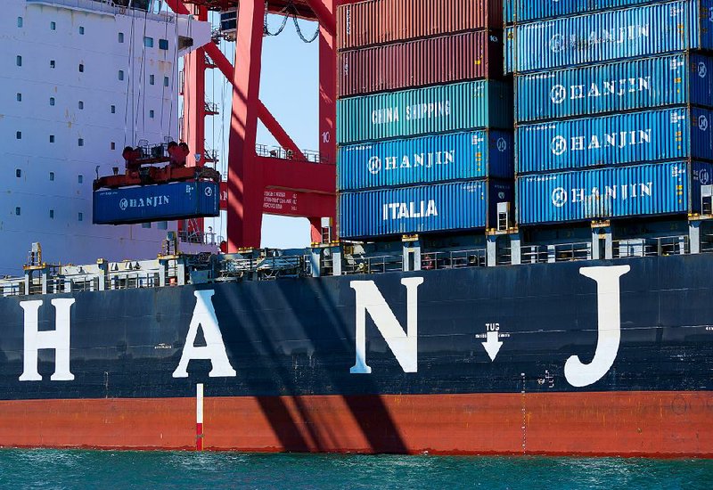 A shipping container is lifted from the Hanjin Gdynia at the Port of Long Beach in September. Hanjin Shipping’s bankruptcy has slowed delivery of stock to U.S. retailers preparing for the annual Christmas rush. 