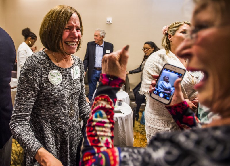Carol Folsom cheers when Proposition 106, which would make assisted death legal among patients with a terminal illness who receive a prognosis of death within six months, is passed at the Westin Denver Downtown hotel on Tuesday, Nov. 8, 2016 in Denver, Colo.