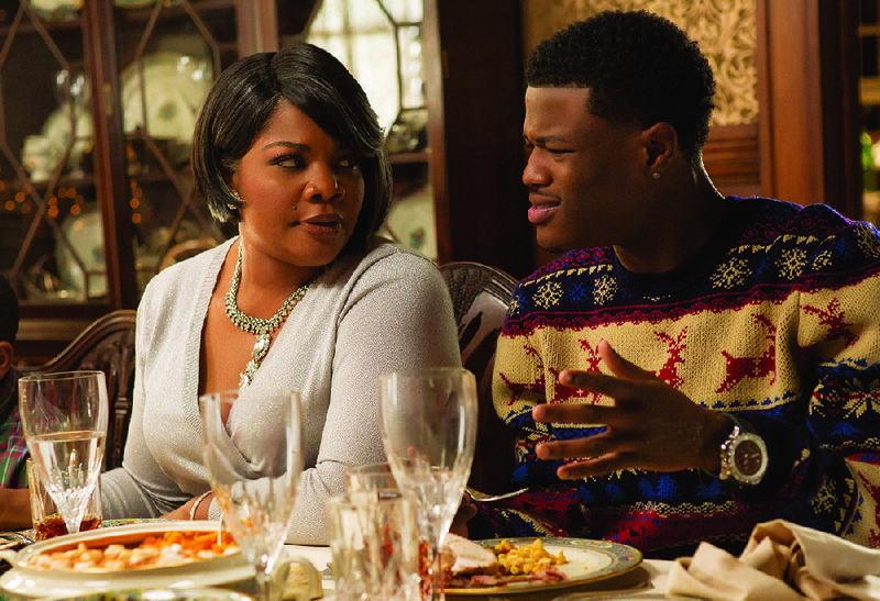 Aunt May (Mo’Nique) and Eric (D.C. Young Fly) are two relatives who gather for the holidays in the comedy-drama Almost Christmas.