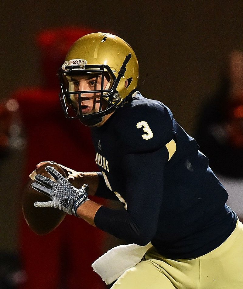 Pulaski Academy quarterback Layne Hatcher looks to throw a pass Friday during the Bruins’ 49-21 victory over Magnolia in the Class 5A playoffs. Hatcher went 15-of-23 passing for 327 yards with 6 touchdowns, all in the first half.